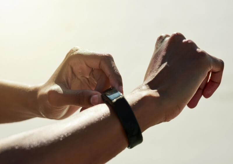A person wearing a health tracker